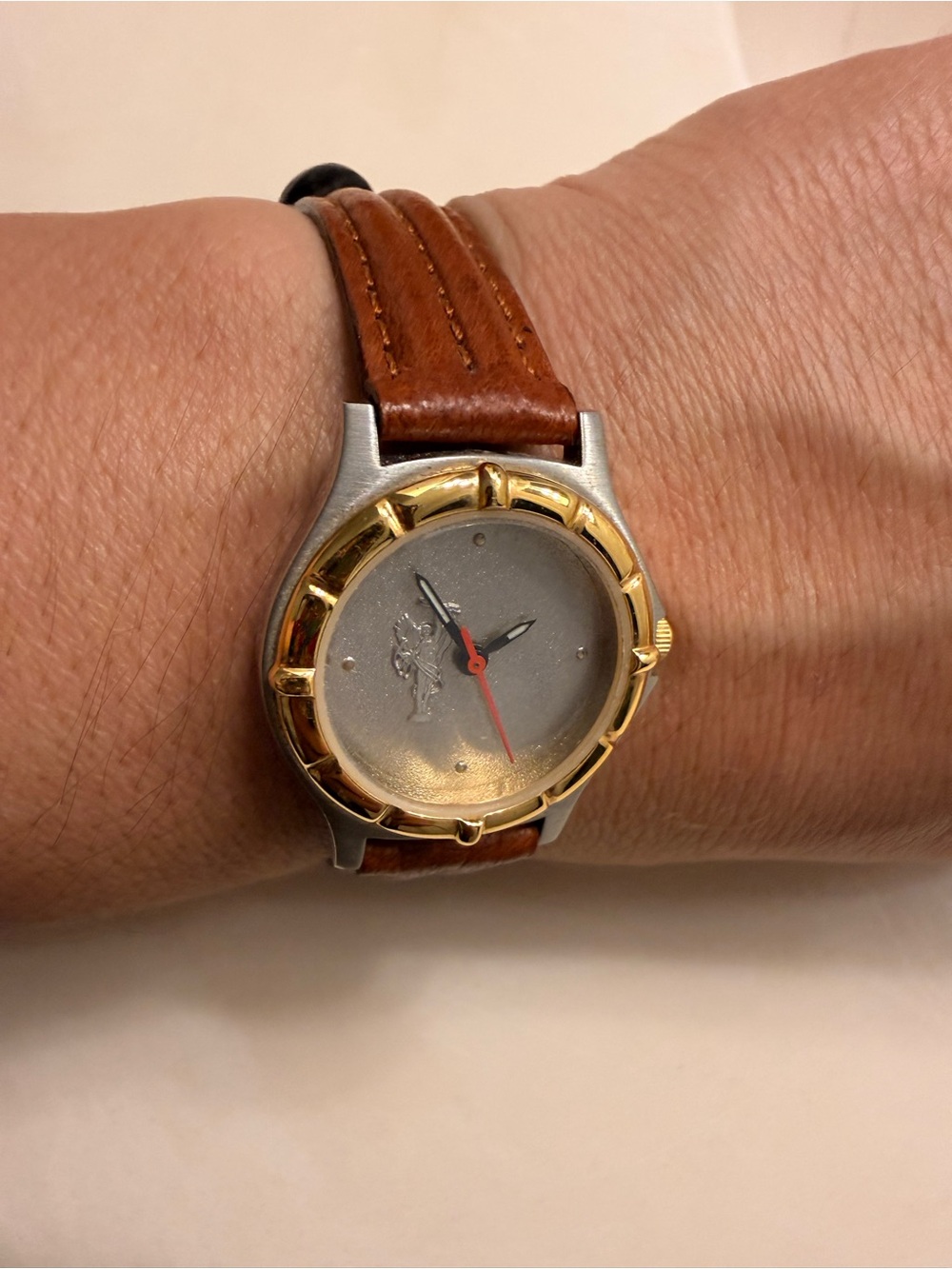Brown Leather-Strap Watch with Gold-Bezel Accent need battery